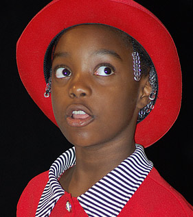 Child in red derby
