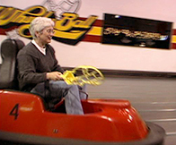 Etta driving a bumper car