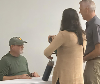 Krueger signing books