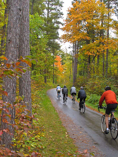Bike riders in autumn scene