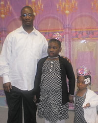 Daddy with his two daughters