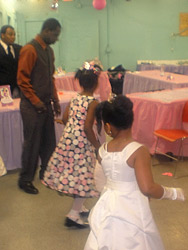 Daddys and daughters and pink tables