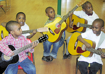 Learning to play, one guitar at a time.