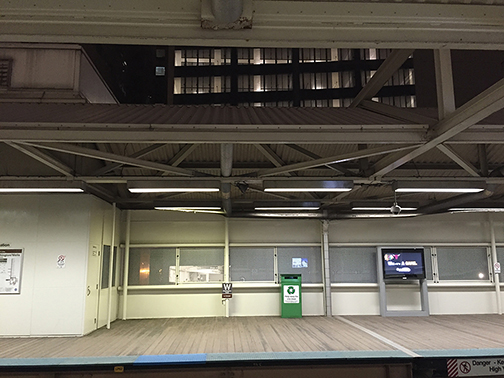 Isolated train platform at night